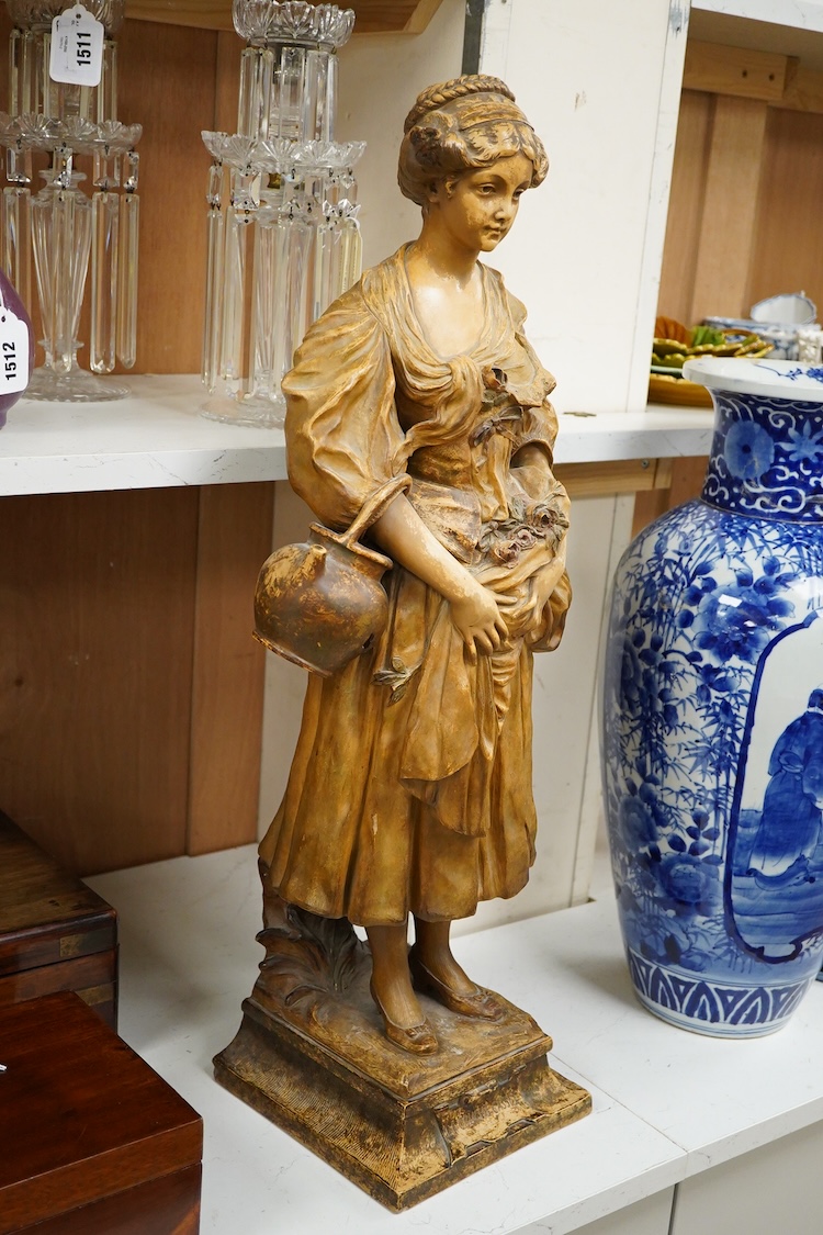 A French pottery figure of a lady, ‘La Cruche Cassée’, manufactured by Van Hasselt & Cie, 73cm
